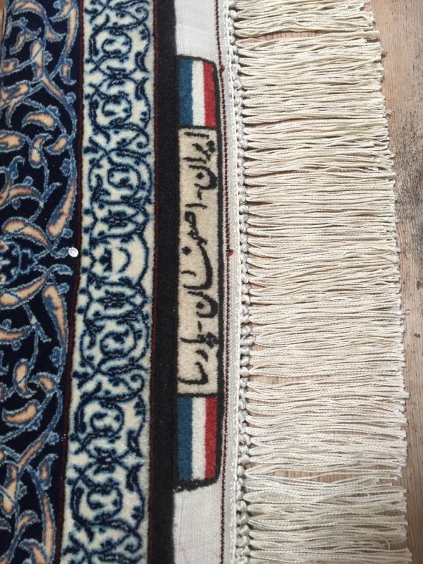 Traditional Persian Rug with intricate patterns.