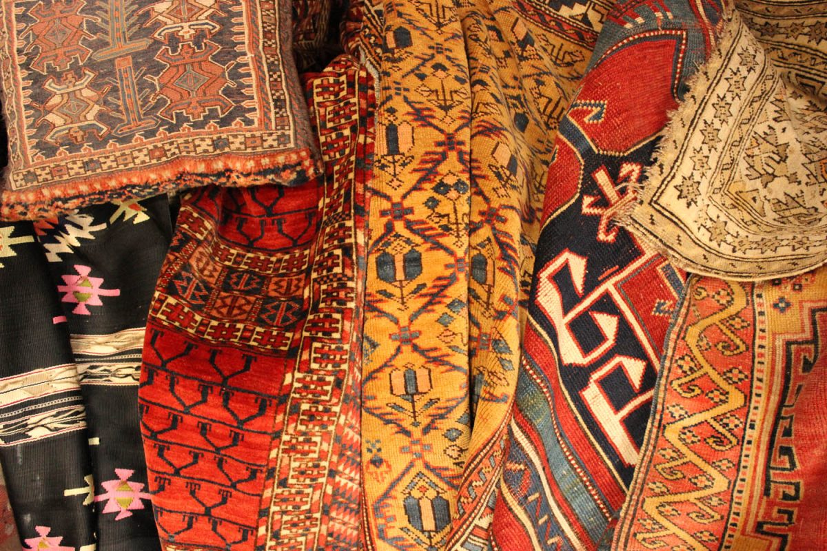 Authentic handmade rugs with intricate patterns and vibrant colors.